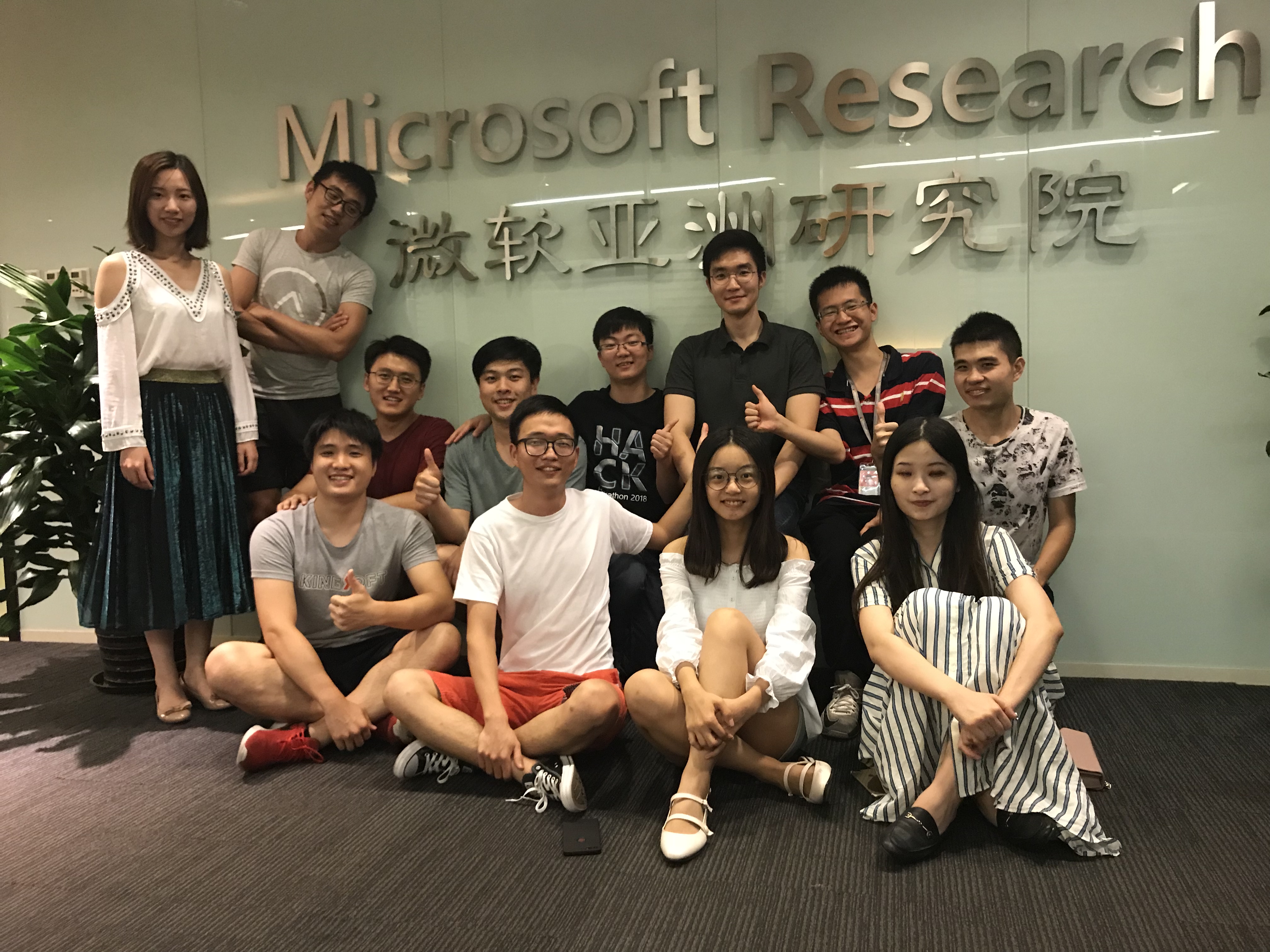 Above: MSRA dining group taking a photo in front of the MSRA logo