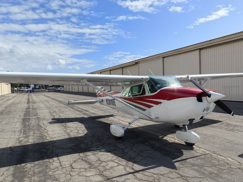 The plane just pushed out of the hangar