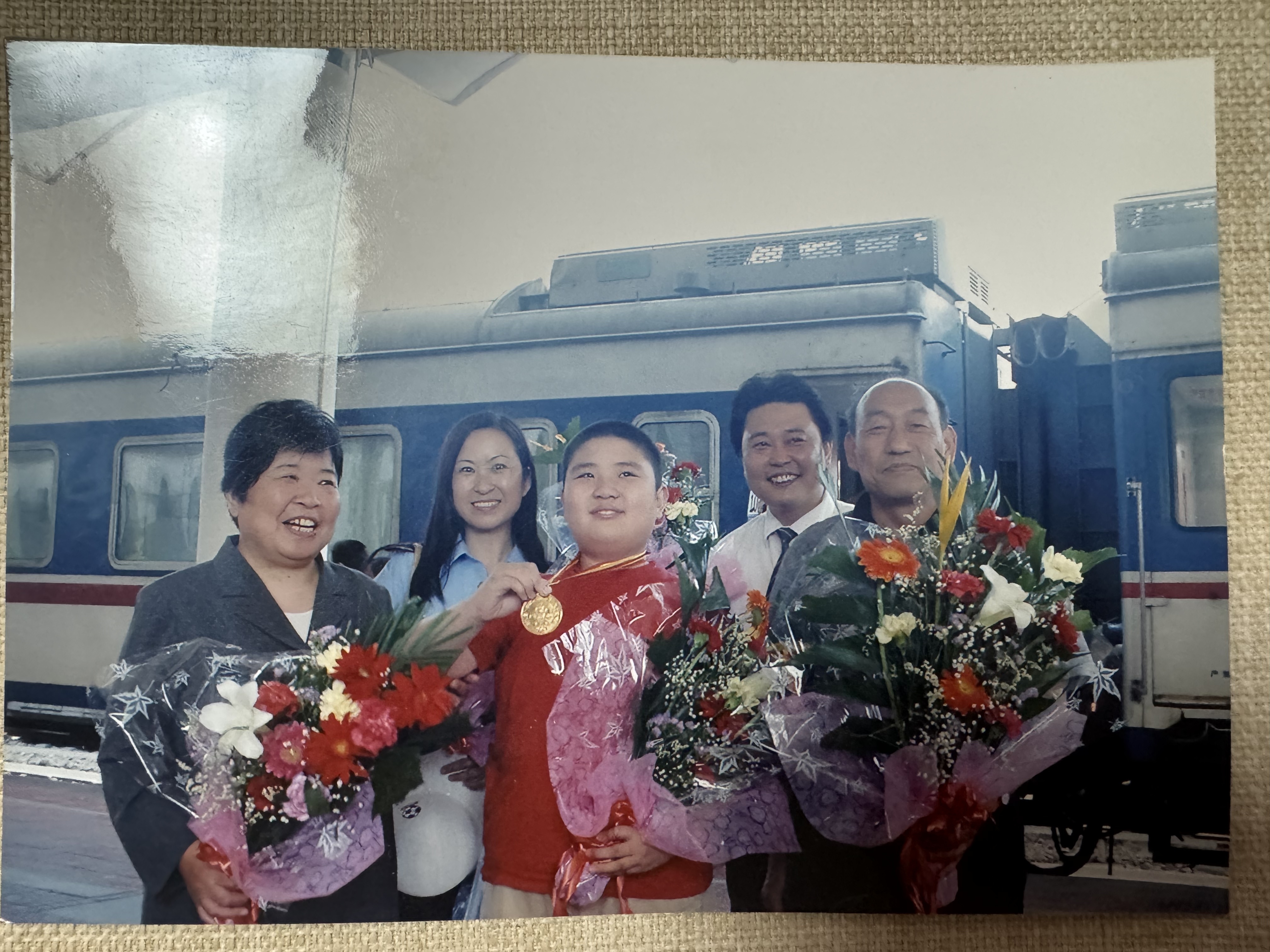 Grandpa and Grandma accompanied me to Chaozhou for the "Hua Luogeng Golden Cup" math competition, where I won a gold medal (only 10 gold medals nationwide)